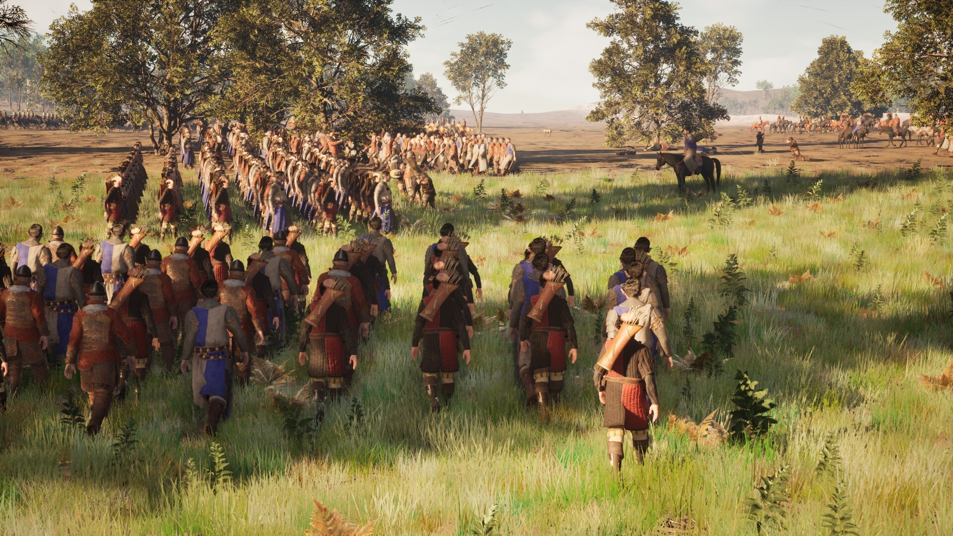 Infantry formations and mounted riders meeting across a grassy battlefield